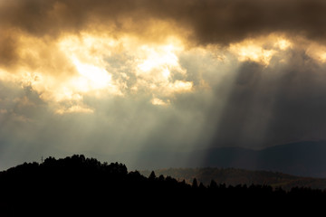 Dark clouds and sun rays