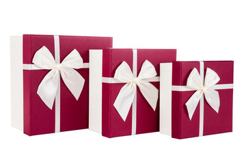 red wine  boxes with white bows isolated on white background
