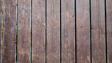 texture of the wooden promenade in a warm autumn day