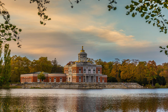 Potsdam, Germany, view across lake Heiliger See in early autumn with  marble palace (Marmorpalais ) in the background and sunset sky  