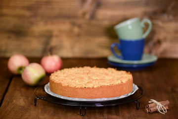Apple pie or homemade cake with apples on table. Delicous dessert apple tart.