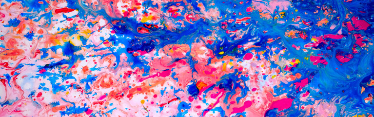 Abstract blue and pink painting on canvas using liquid acrylic technique. Marble slice texture