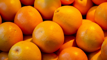 Close up of oranges from city market in warm colors