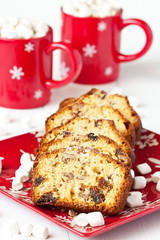 Christmas composition with  cake portion  and hot chocolate drink in mug
