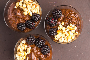 Dark chocolate mousse with blackberries and roasted hazelnuts
