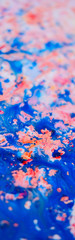 Abstract pink and blue painting on canvas using liquid acrylic technique. Marble slice texture