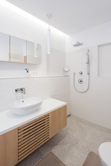 Fototapeta na wymiar Interior of contemporary bathroom with bathtub and shower