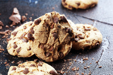 Chocolate cookies on wooden table. Chocolate chip cookies shot on table