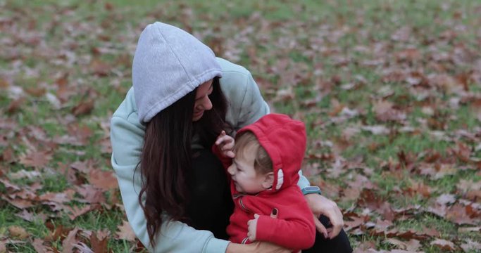 Infant boy in sweatshirts with a hood
