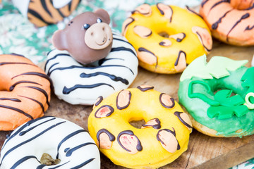 Colorful delicious cute animals donuts. animal donut. Animal print