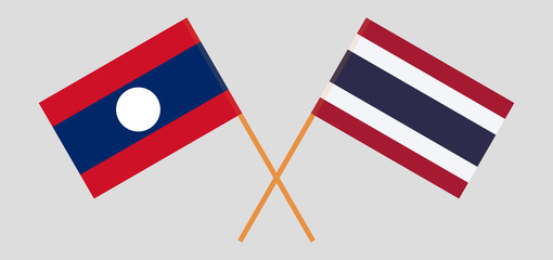 Laos and Thailand. Laotian and Thai flags