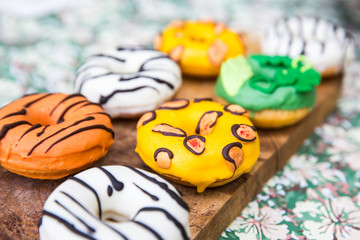 Fototapeta na wymiar Colorful delicious cute animals donuts. animal donut. Animal print