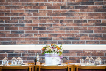Lunch table with brick wall background 
