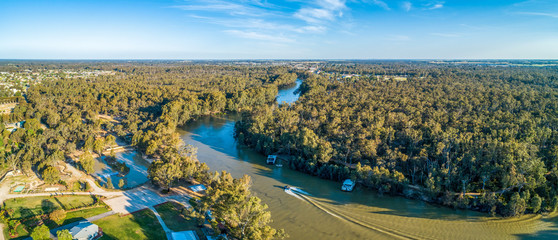 Aerial panoramic landscape of boat sailing on Murray River in Australia
