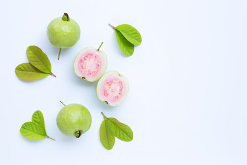 Fresh ripe guava and slices with leaves. Top view