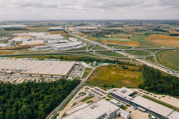Aerial view of the distribution center, drone photography of the industrial logistic zone.