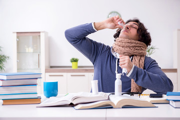 Sick male student suffering at home