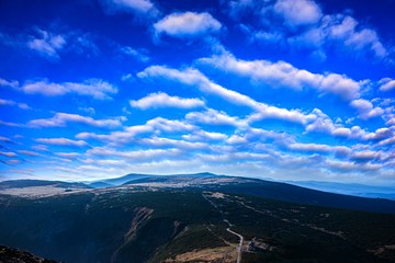 Fototapeta premium A journey on foot to the top of the mountain. Lifestyle. Go to the target . In autumn view from mountain peaks . 