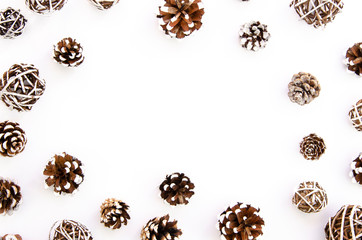 Frame mockup Winter and Christmas background from pinecones over white background. flatlay copy space