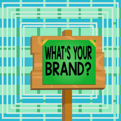 Text sign showing What S Your Brand Question. Business photo text asking about product logo does or what you communicate Wood plank wooden stick pole paper note attached adhesive tape empty space