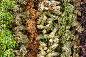 piles of medicinal plants in the market of Colombia