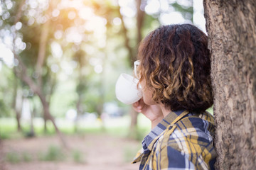 Woman enjoying fresh cooffee stock photo