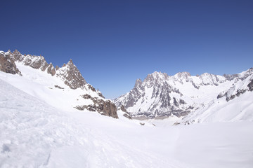 Fototapeta na wymiar Vallee Blanche above Chamonix from the Aiguille du Midi in French Alps in Spring with Canon 11mm - 22mm Wide Angle Lens
