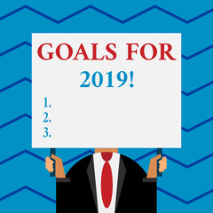 Word writing text Goals For 2019. Business photo showcasing object of demonstratings ambition or effort aim or desired result Old fashioned way to pick people at airport hold big board with two hands