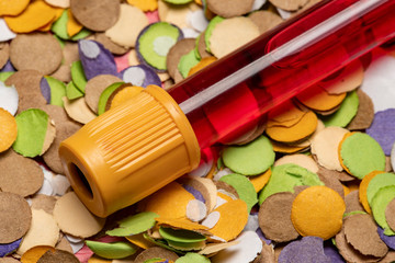 donate blood during the carnival. Confetti Background with Blood Tubes