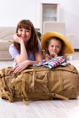 Obraz premium Happy family planning vacation trip