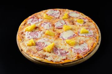 Hawaiian Pizza isolated on black