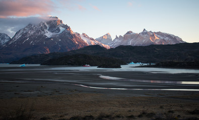 Breathtaking Winter Sunrise over Torres Del Paine Mountain Range and Glacier Grey in Patagonia Chile