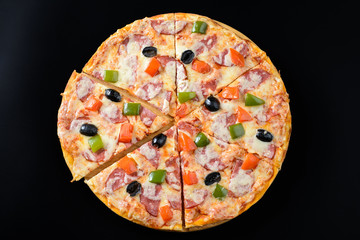 Pizza isolated on black