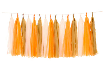 Garlands of paper tinsel white, orange, tan colors
