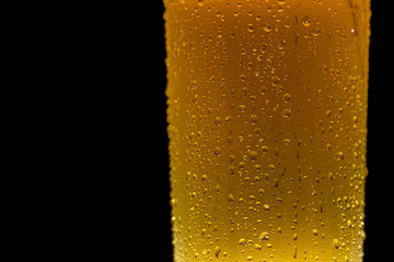 Droplets on freshly poured beer detail macro delicious unfocused