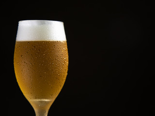 Droplets on freshly poured beer detail macro delicious unfocused