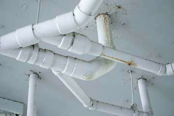 Water leakage from the sewer in building. Pipeline leaked with dirty water droping to the floor....