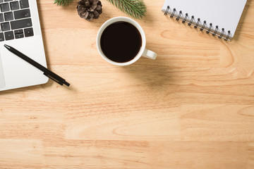 Flay lay, Top view office table desk with smartphone, keyboard, coffee, pencil, leaves with copy space background.