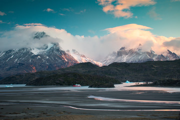 Breathtaking Sunrise over Torres Del Paine Mountain Range and Glacier Grey in Patagonia Chile