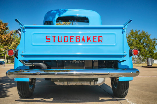 Back side view of a light blue color vintage Studebaker pickup truck classic car on October 19, 2019 in Westlake Texas.