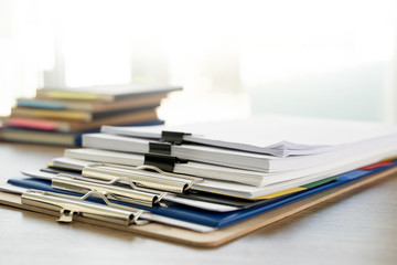 man report stack paper folder close up stacking of office working document with paper legal paperwork on top