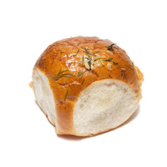 One lush baked bun with garlic, dill and other spacy isolated on white.