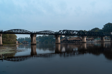 Fototapeta na wymiar Railway bridge across the River Kwai river, at Kanchanaburi Thailand.