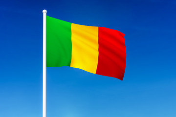 Waving flag of Mali on the blue sky background