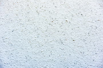 Texture of a concrete wall with cracks and scratches which can be used as a background