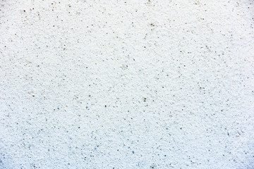 Texture of a concrete wall with cracks and scratches which can be used as a background
