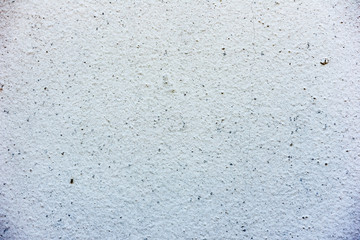 Texture of a concrete wall with cracks and scratches which can be used as a background