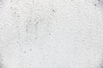 Texture of a concrete wall with cracks and scratches which can be used as a background