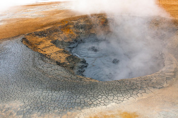 Panorama of geothermal area Hverar&ouml;nd (Hverir), situated by the orange-red clay coloured tuff mountain Namafjall south of N&aacute;maskar&eth; in Iceland, with details and patterns