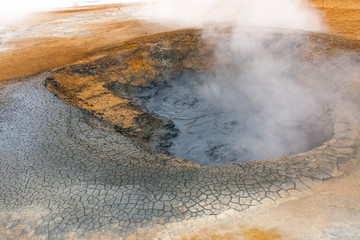 Panorama of geothermal area Hverar&ouml;nd (Hverir), situated by the orange-red clay coloured tuff mountain Namafjall south of N&aacute;maskar&eth; in Iceland, with details and patterns